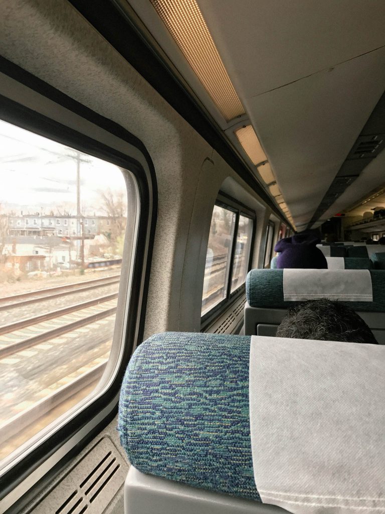 a view of a train from inside the car.
