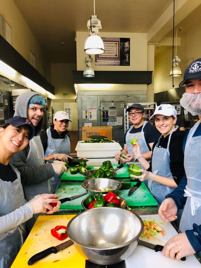 TravelBank employees volunteer at a local kitchen in SF