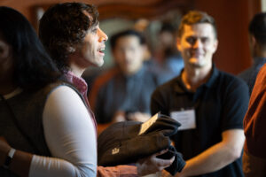 A group of people in a room.