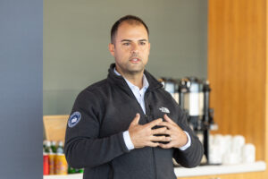 A man standing in front of a group of people.