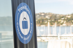 A blue and white sign with a lock on it.