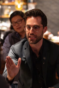 A man wearing glasses.