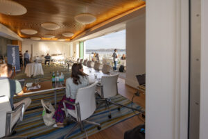 A group of people in a conference room.