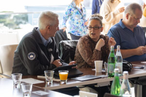 A group of people sitting at a table.