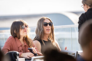 Two women sitting at a table.